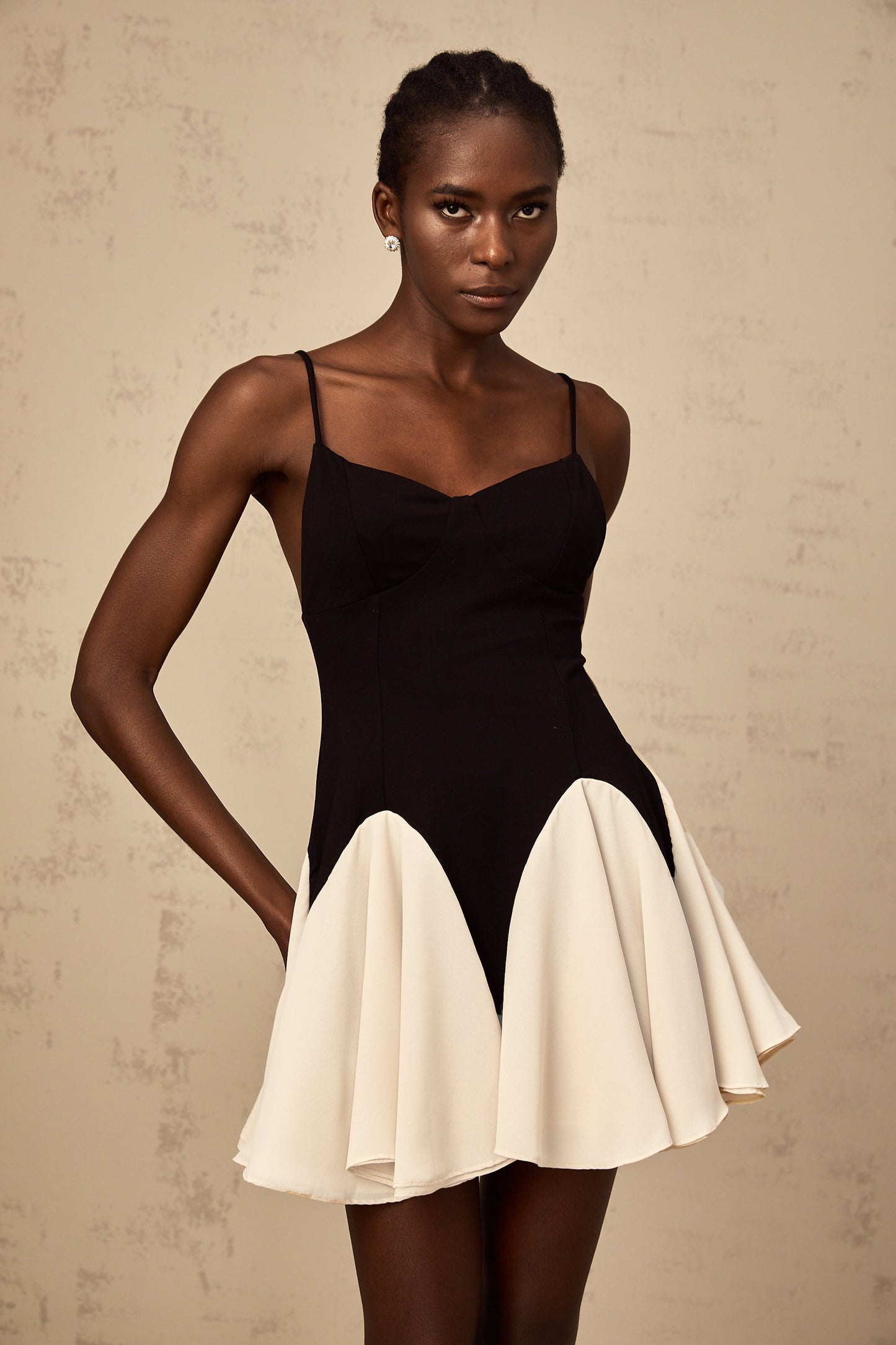 Justine color-blocked godet pleated mini dress