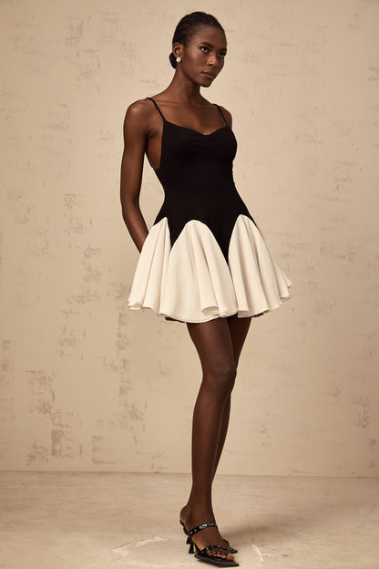 Justine color-blocked godet pleated mini dress
