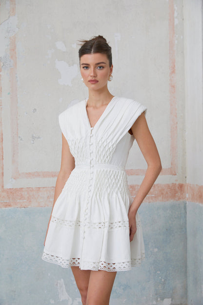 Anaïs cut-out faux-pearl embellished mini dress
