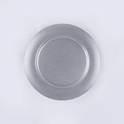 Stainless steel round VINTAGE INOX plate with a chic design, durable and multi-purpose, perfect for various occasions.