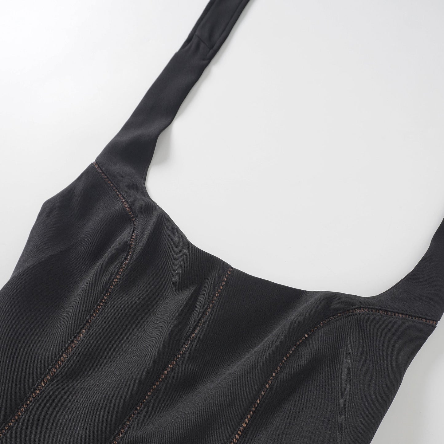 Quirine halterneck bow-detail mini dress in Black
