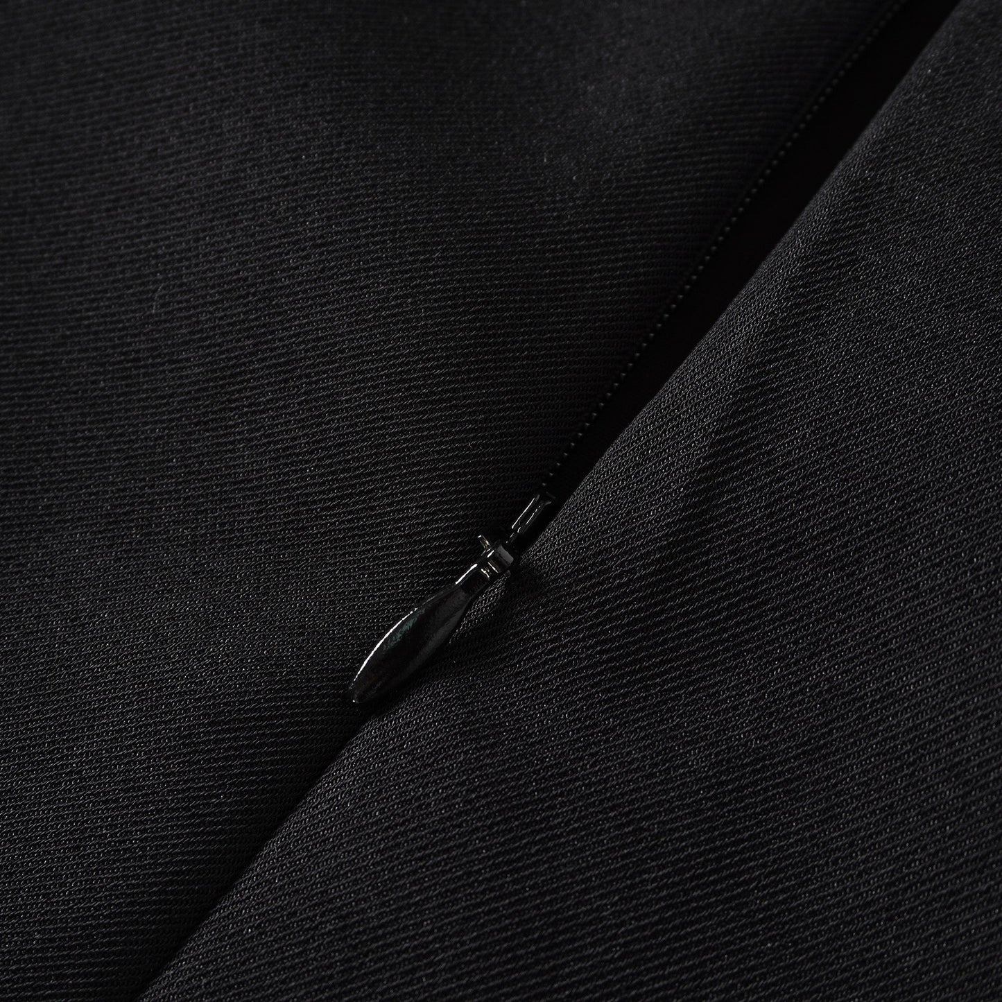 Quirine halterneck bow-detail mini dress in Black