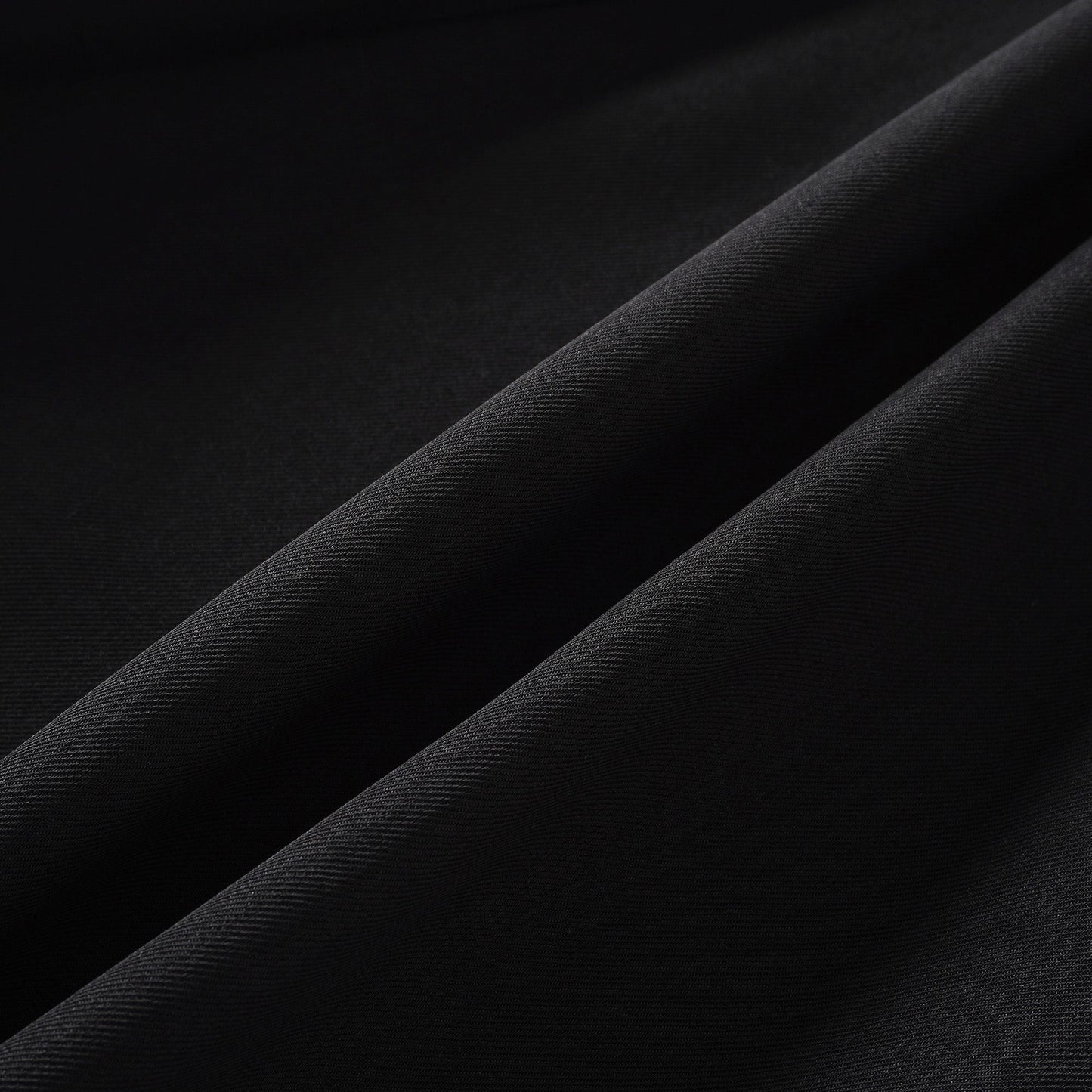 Quirine halterneck bow-detail mini dress in Black
