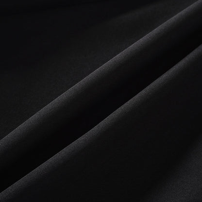 Quirine halterneck bow-detail mini dress in Black