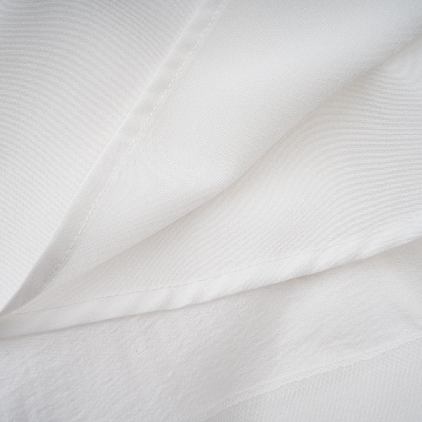 Quincie white shirred flounced mini dress