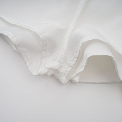 Olivia white halterneck ruffled mini dress