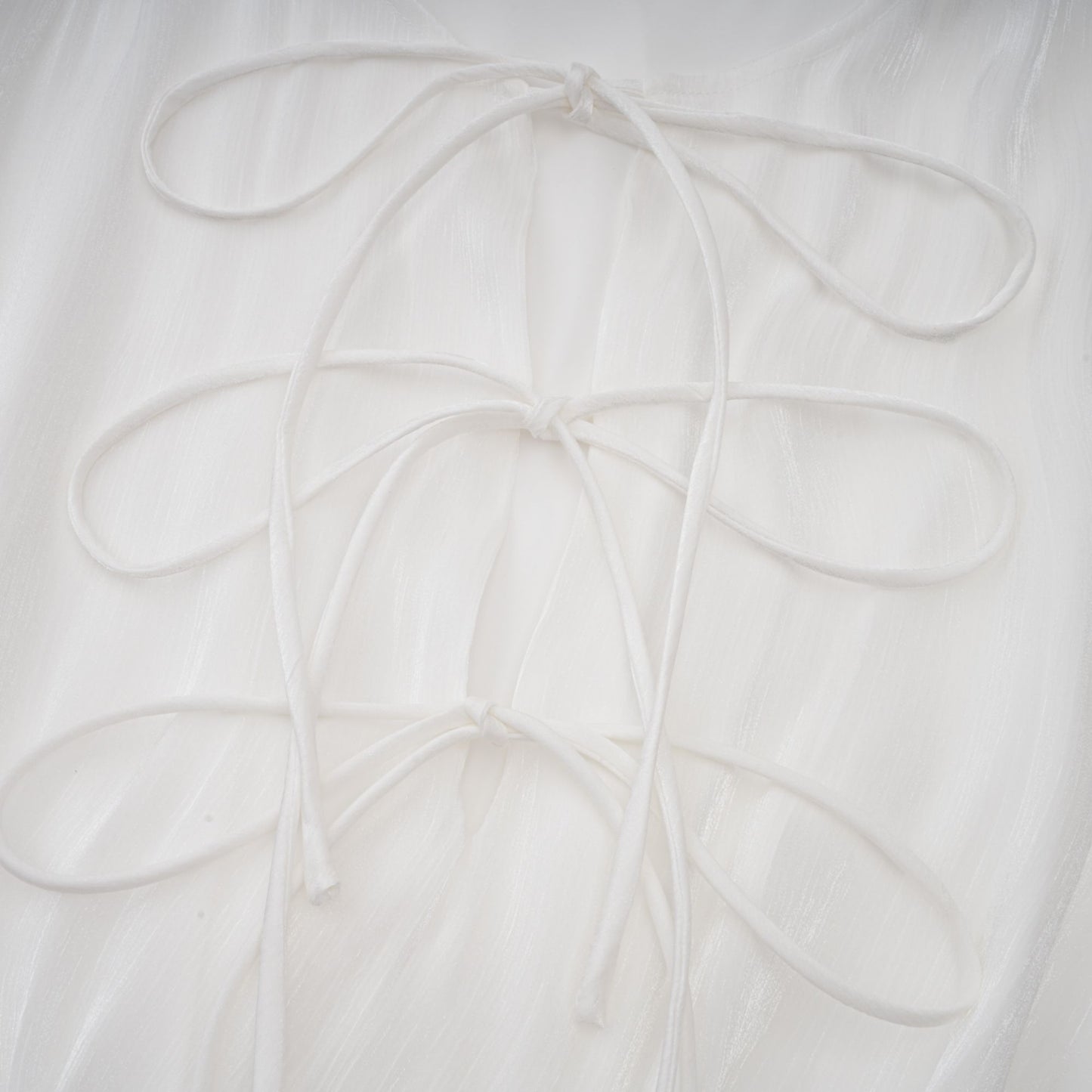 Mahault white pleated glitter-effect mini dress