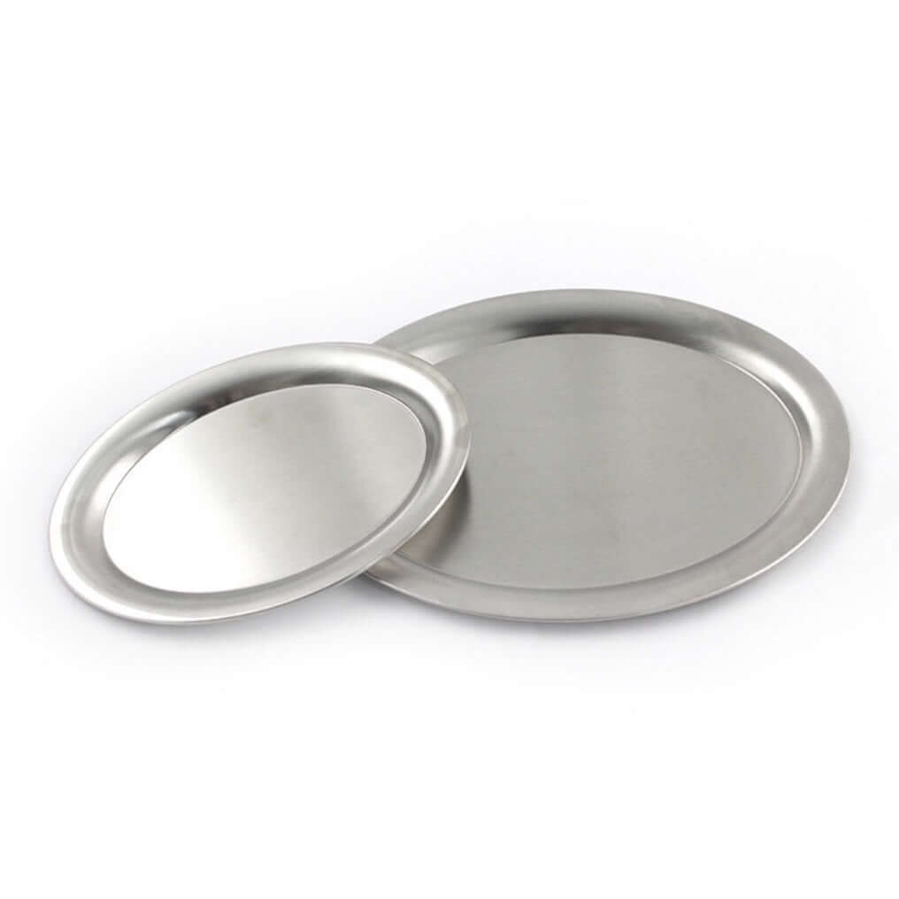 Stainless steel plates with matte finish, part of exclusive collection, perfect for versatile use and safe for all foods.