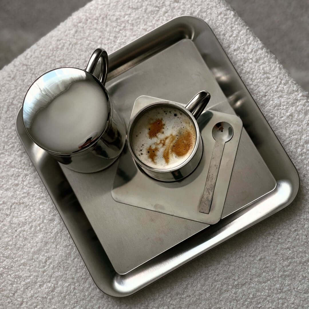 Urban Chic square stainless steel serving tray, elegant minimalist design, 23 cm x 23 cm, perfect for desserts. Dishwasher safe.