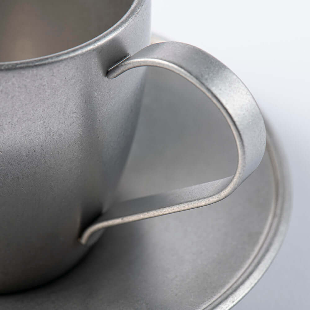 Vintage INOX cup and saucer set in packaging made from 18-8 stainless steel, made in Japan.